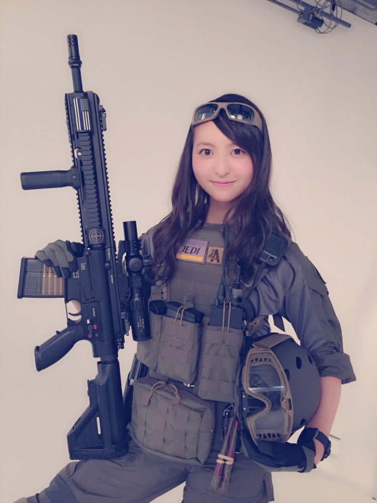 Asian woman with a gun