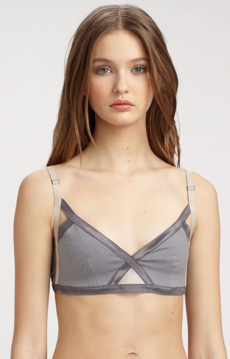 Slim girl with small breasts