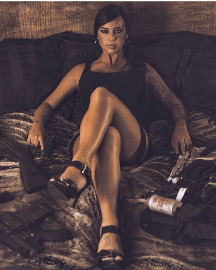 Alex Zedra with guns