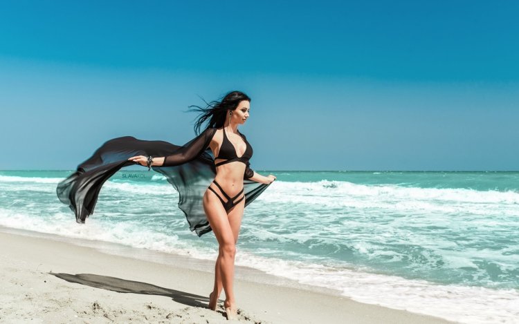 Ksenia Lukyanchikova in a swimsuit at sea