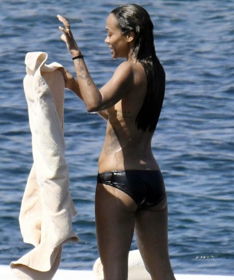 Zoe Saldana on the beach
