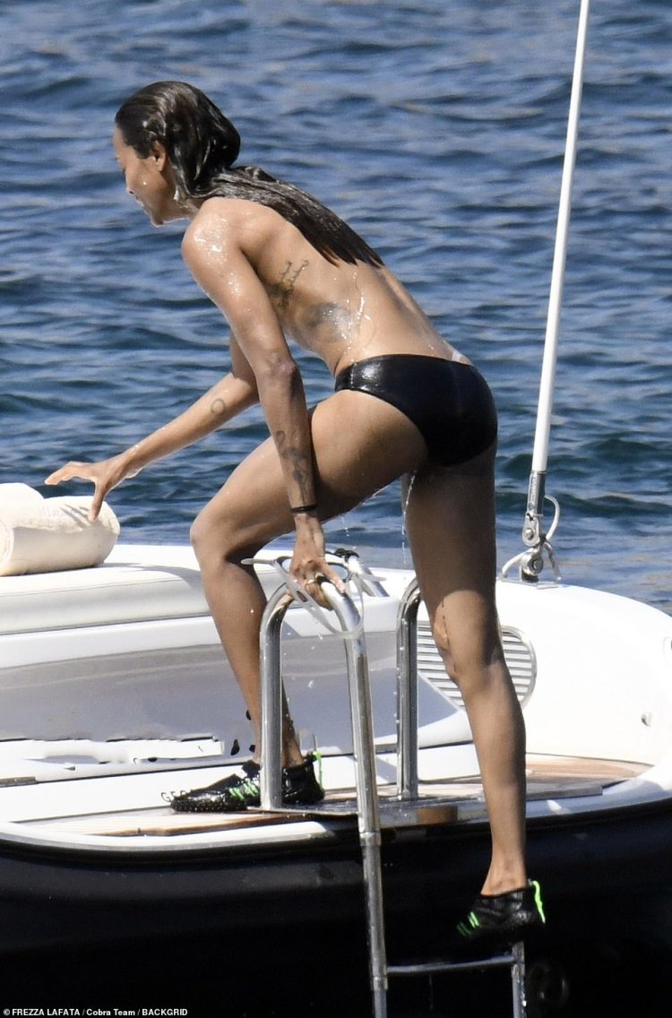 Zoe Saldana draining on a yacht