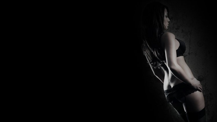 Girl on a dark background