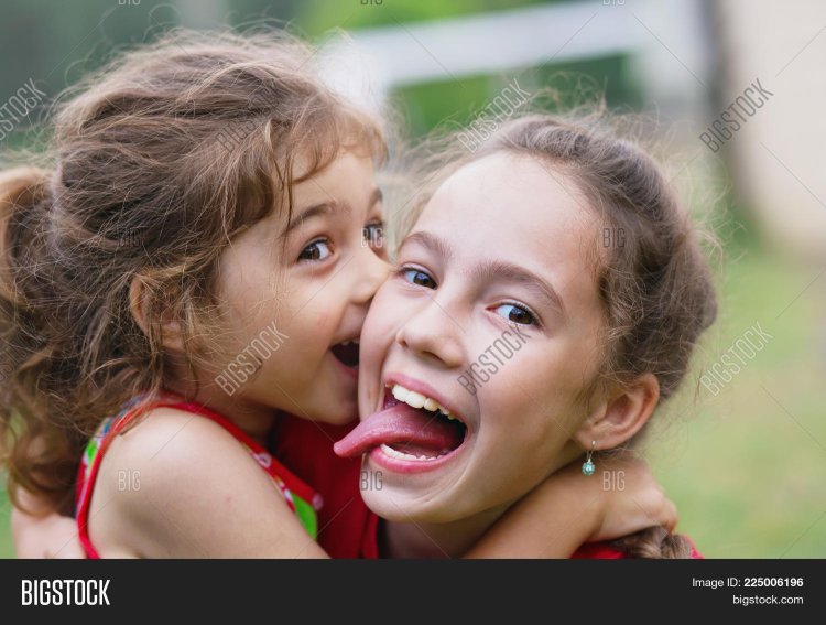 Children kiss with tongue