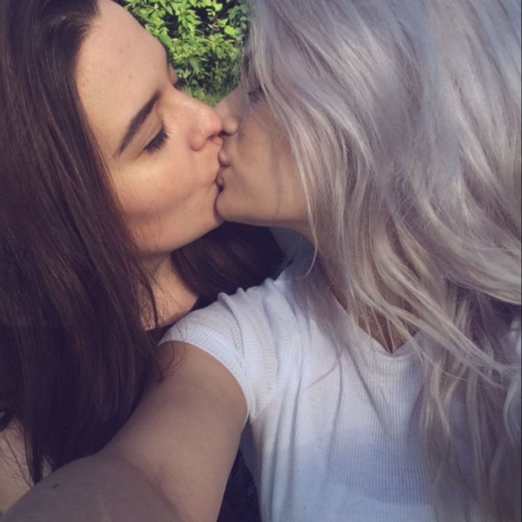 Kiss of two blonde girls
