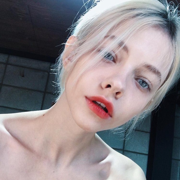 Kira Raush with white hair