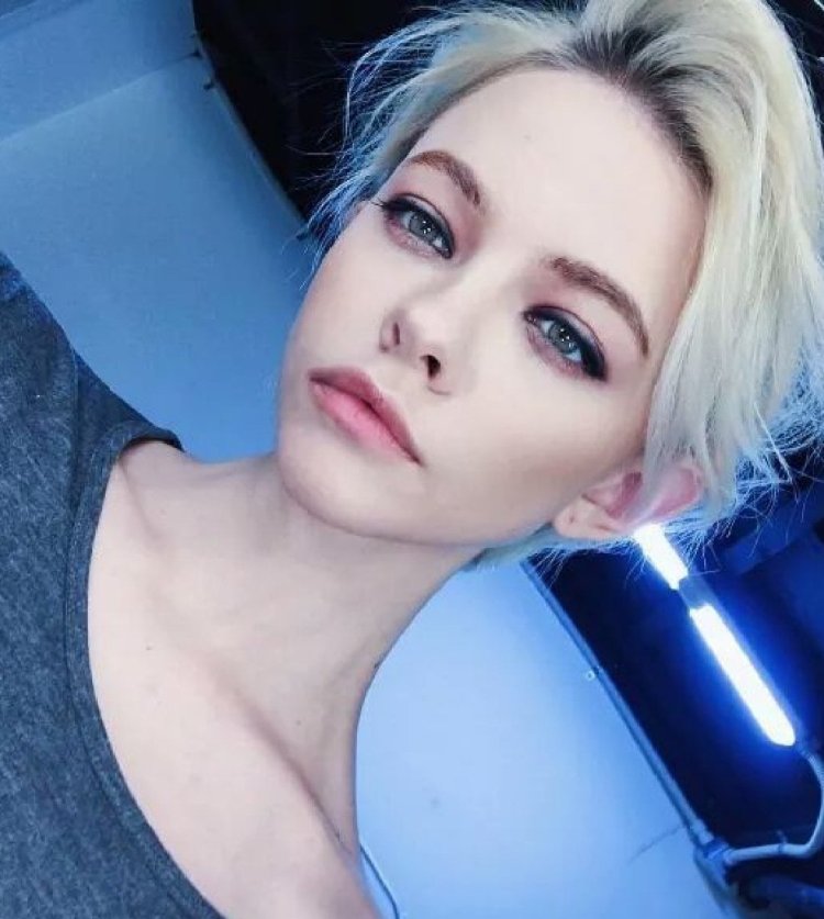 Kira Raush with short hair