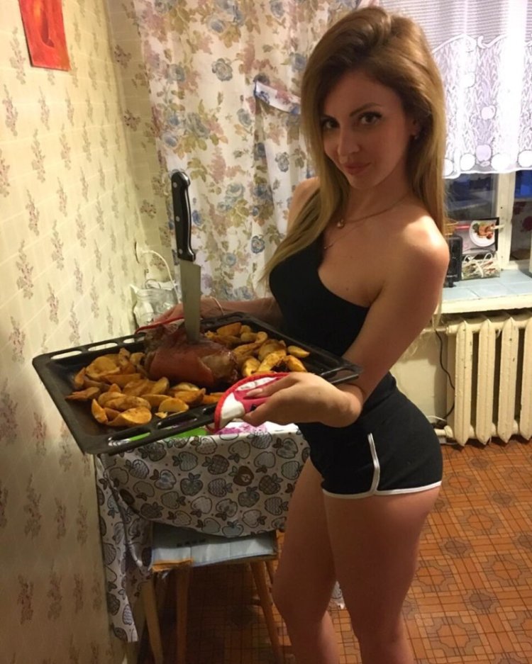 Beautiful woman in the kitchen from social media