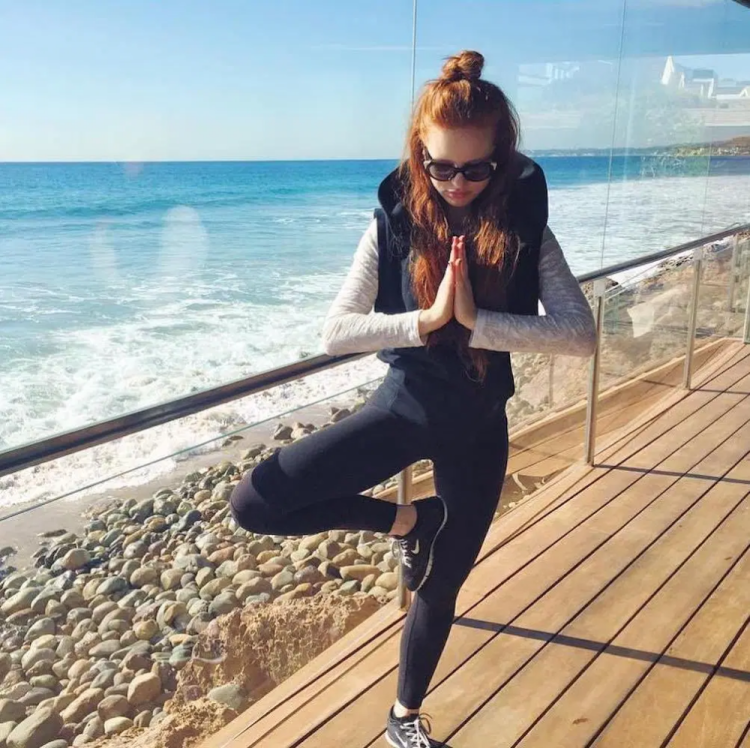 Madeline Petsch on the beach