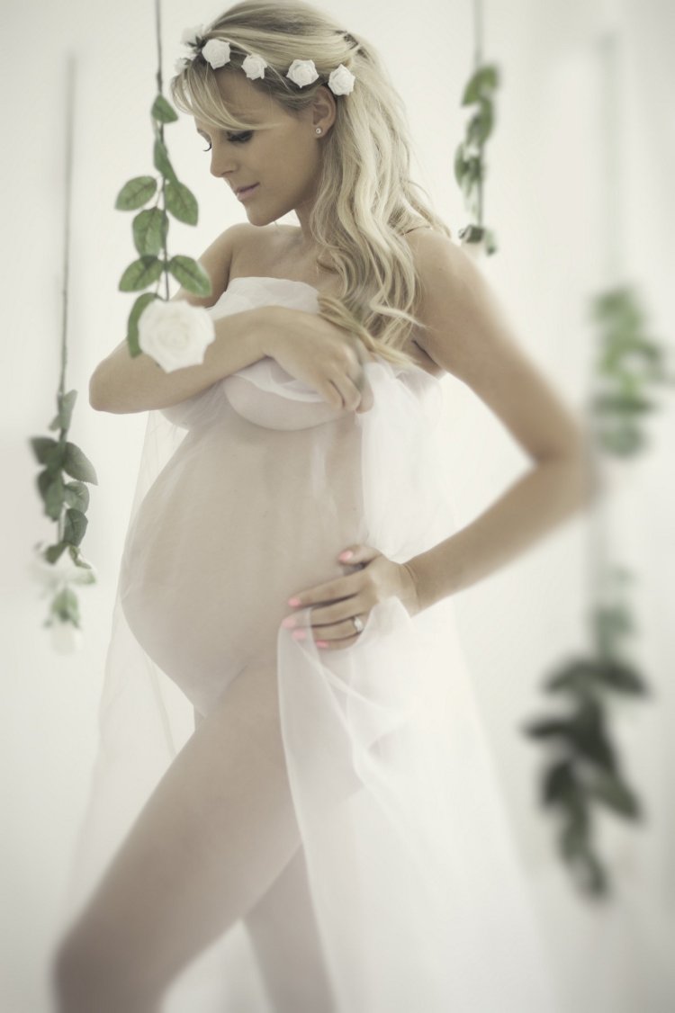 Pregnant bride with veil