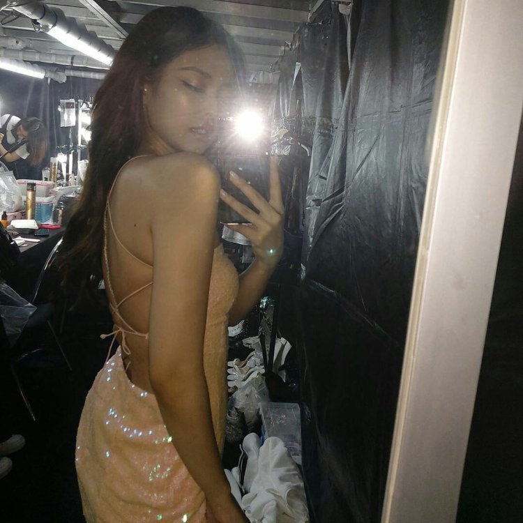 Jenny in front of the mirror