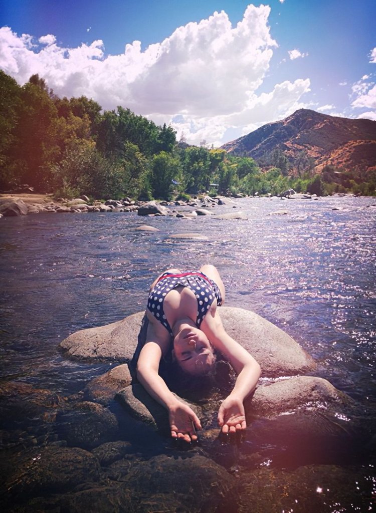 Milana Vayntrub in a swimsuit