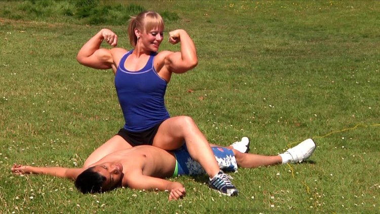 Muscular woman against