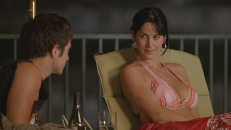 Carrie-Anne Moss in a bikini