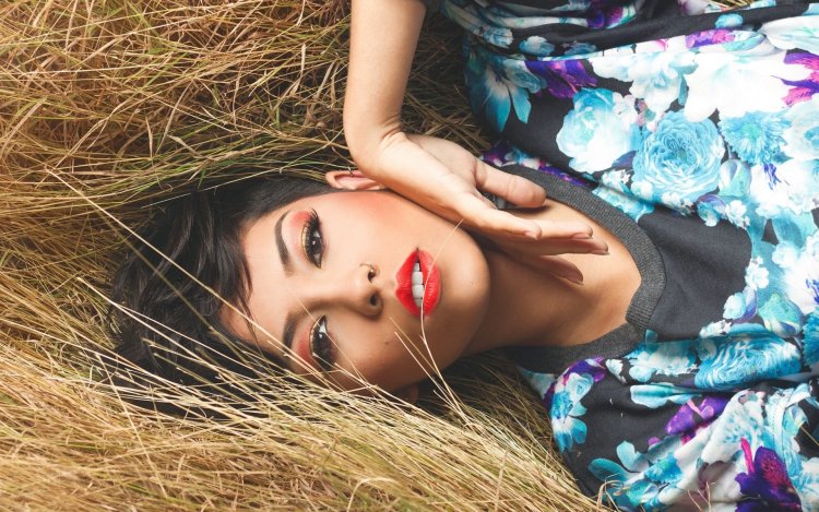 Girl with makeup on the beach