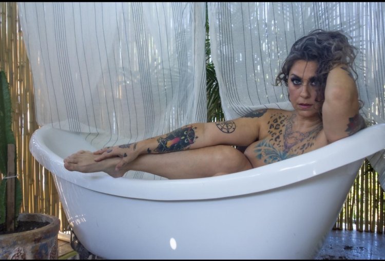 Danielle Colby in a swimsuit