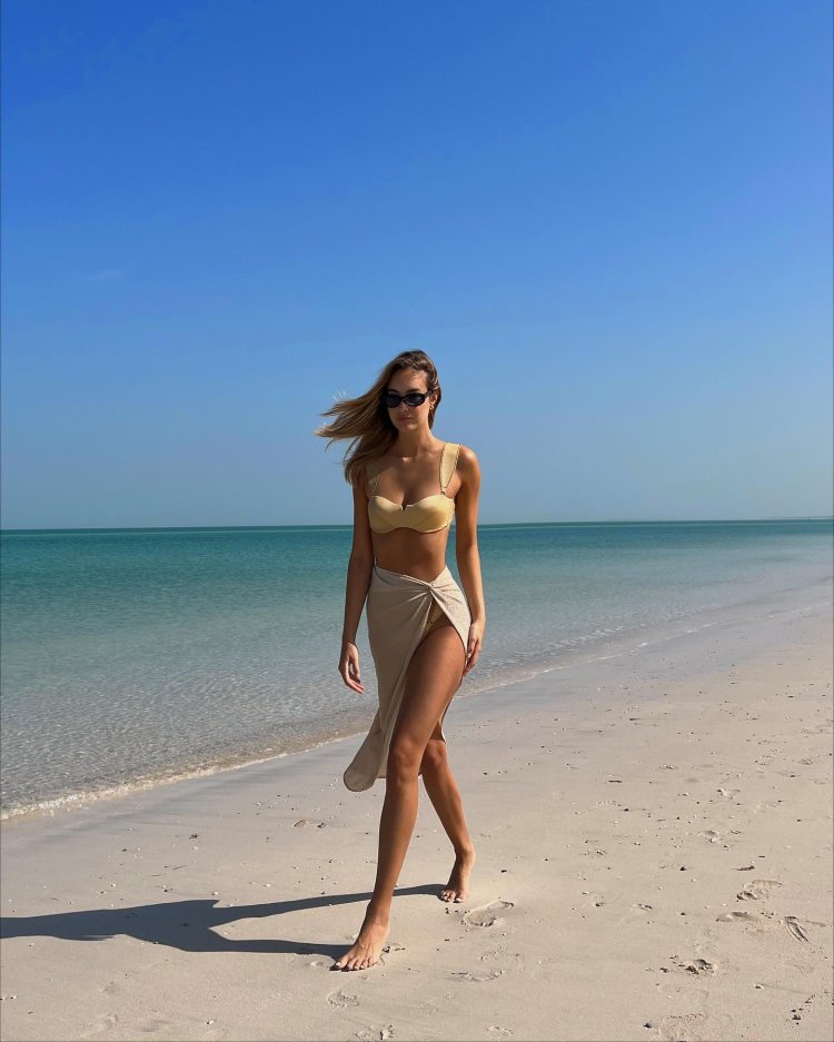 Victoria Varga in a dress