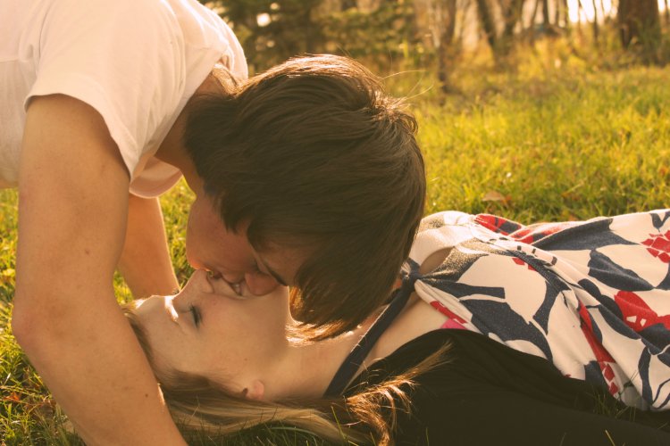 Boy and girl kissing