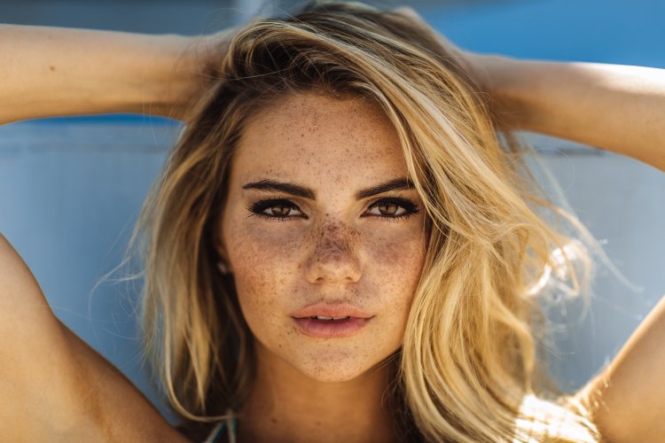 Blond hair and freckles