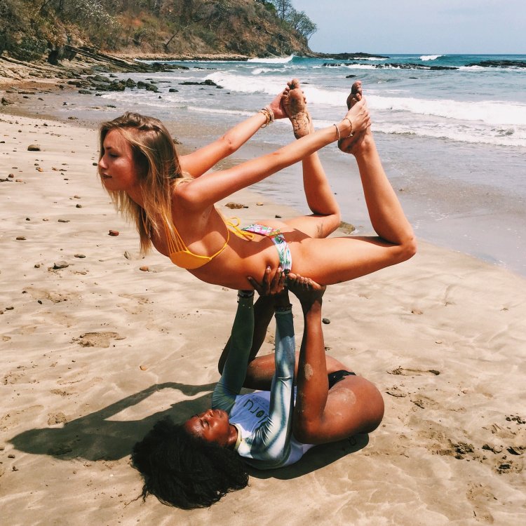 Lift and carry on the beach in a bikini