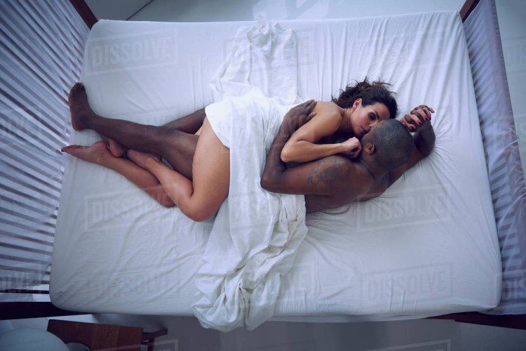 Black girl White man in the Bed
