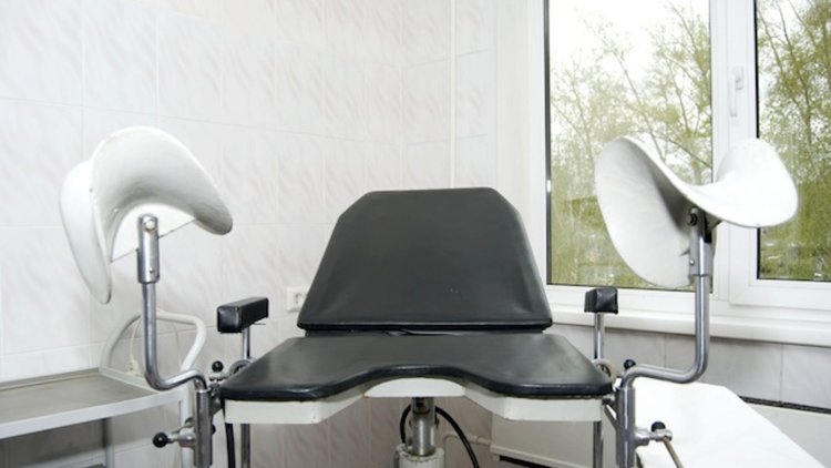 Gynecological examination on chair