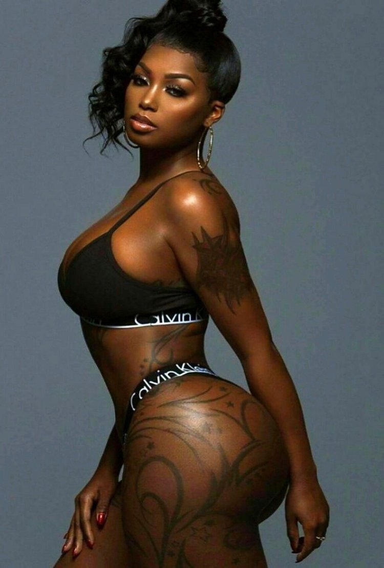 Tiona Fernan in a dress