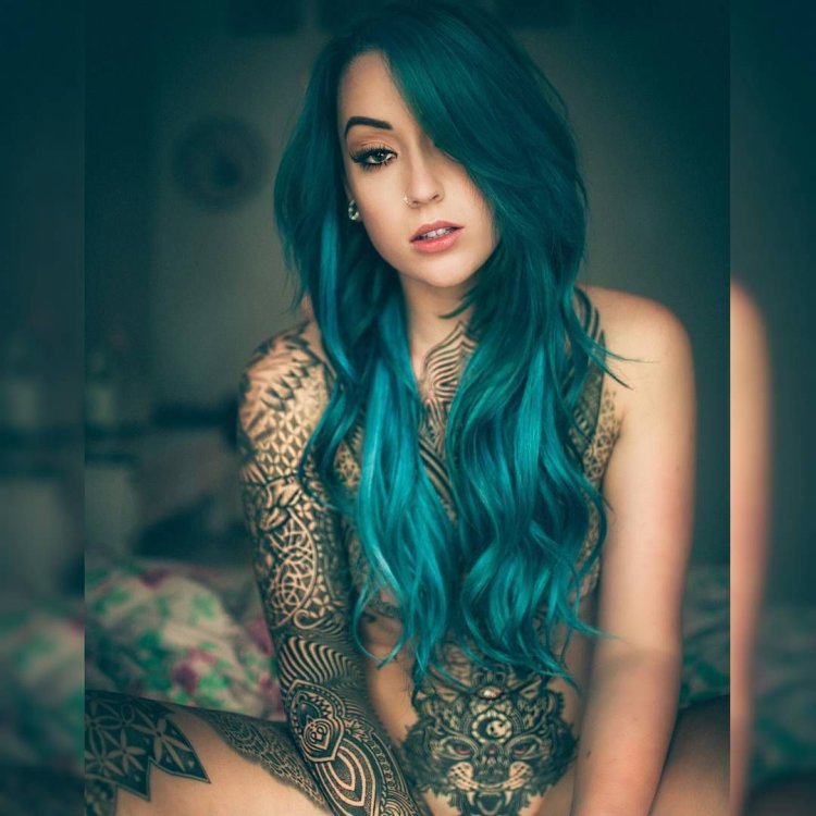 Tattooed girl with blue hair