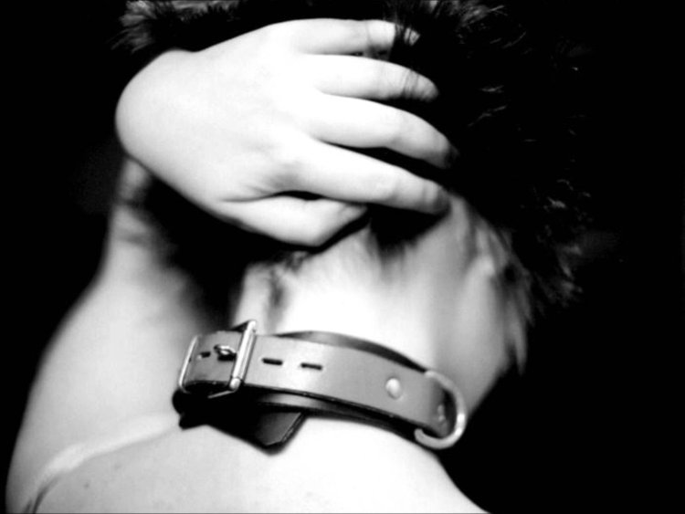 Guy in a collar and handcuffs