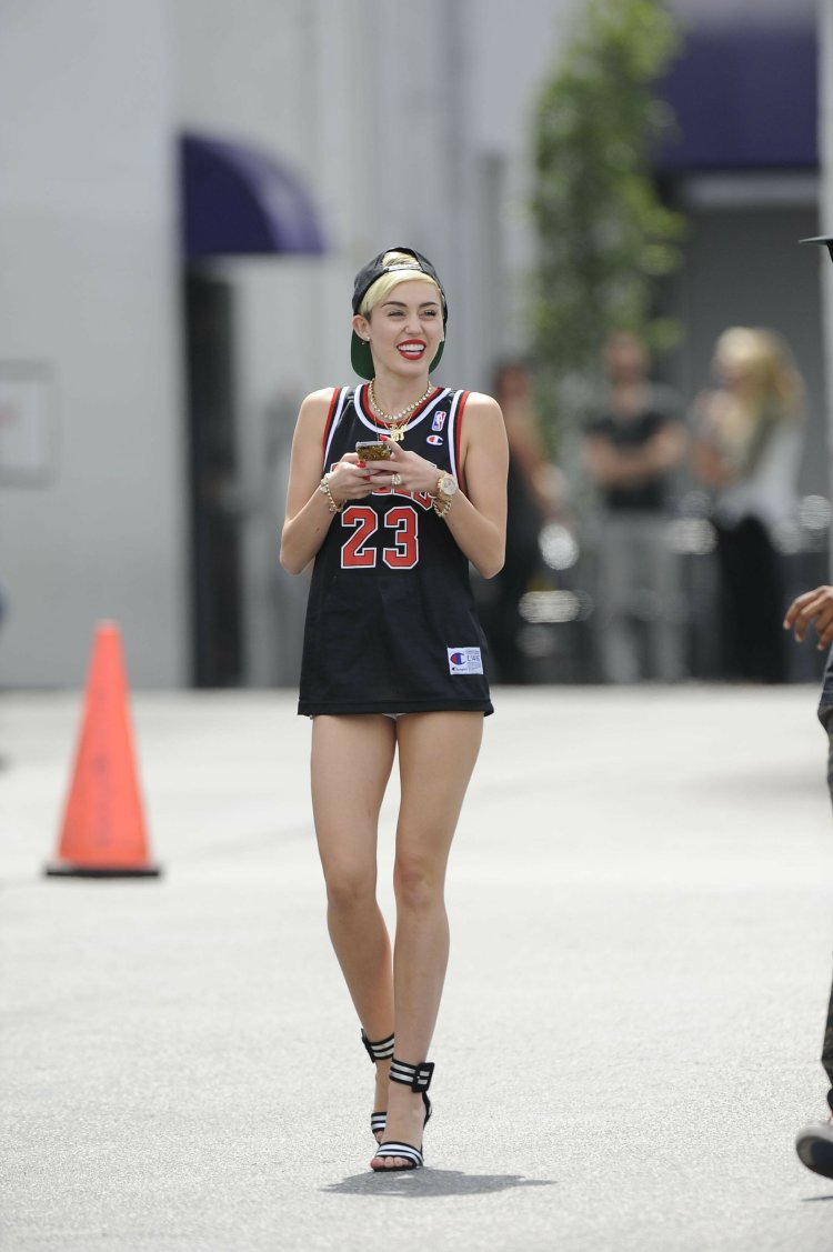 Miley Cyrus in basketball uniform