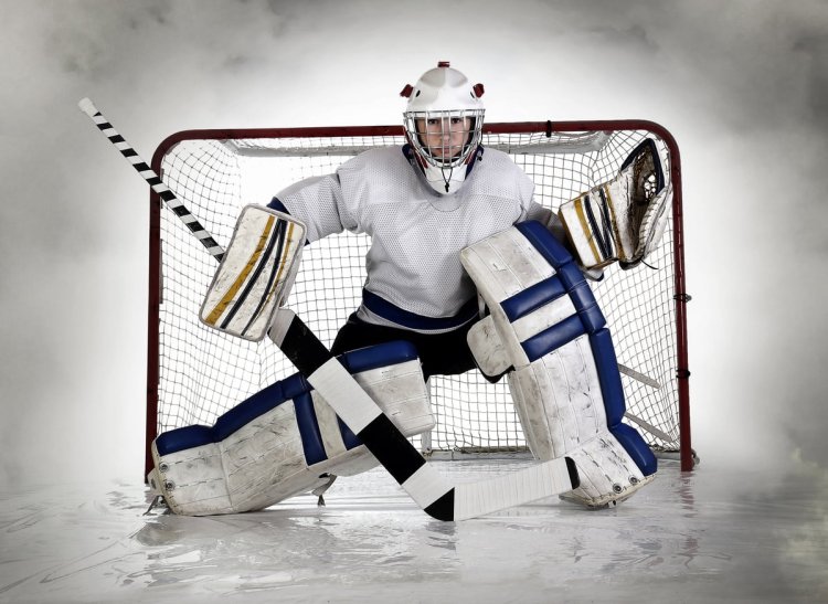 Hockey goalie at the gate