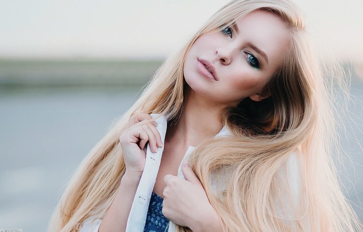 Blonde with blue eyes