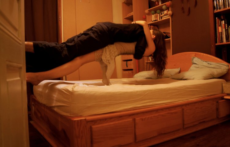 Star pose on the bed