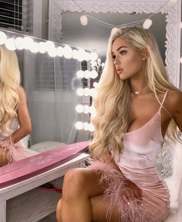 Katerina Rozmajzl in a dress