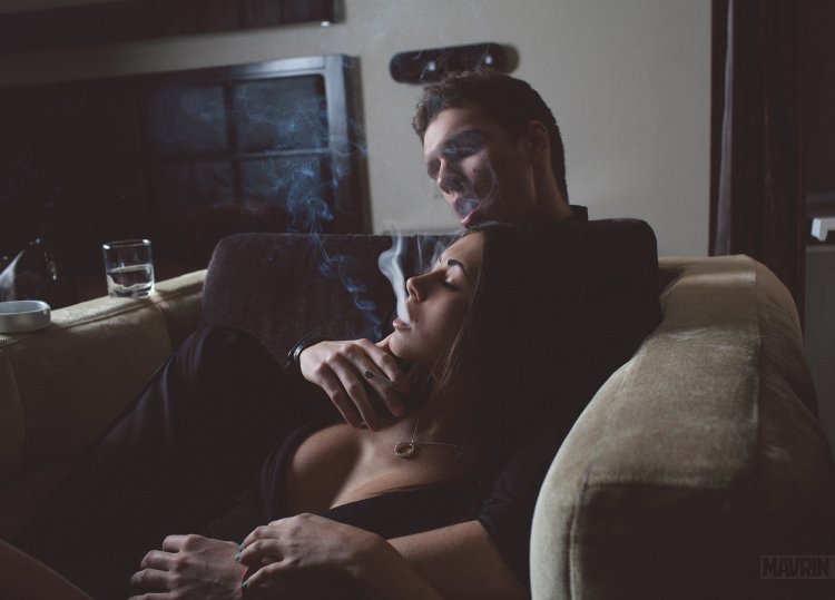 Girl and man smoking