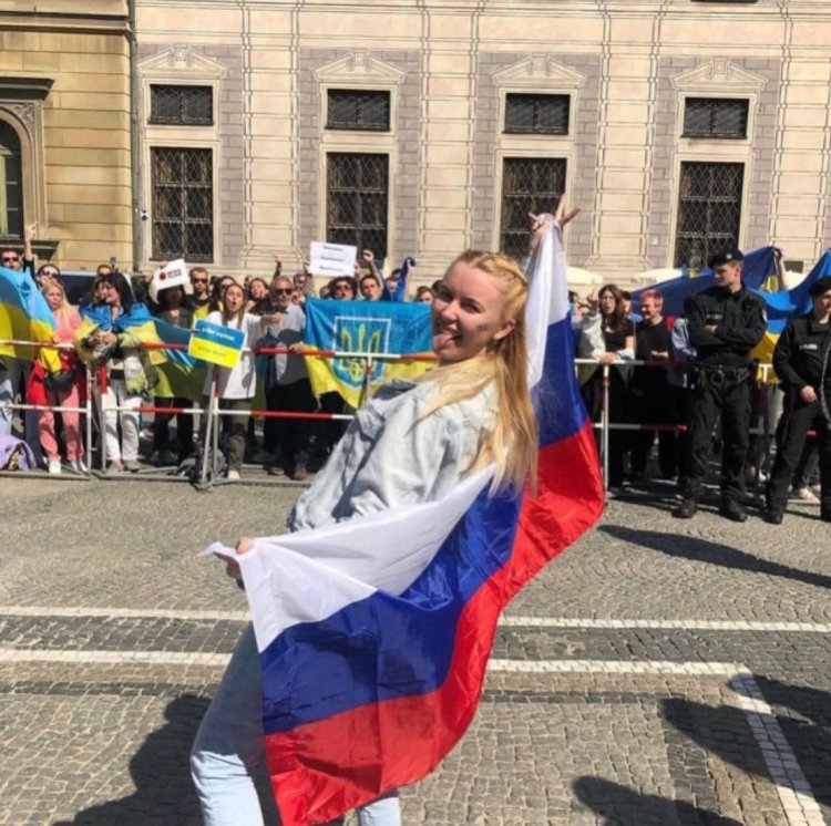 Girl on the background of the Ukrainian flag