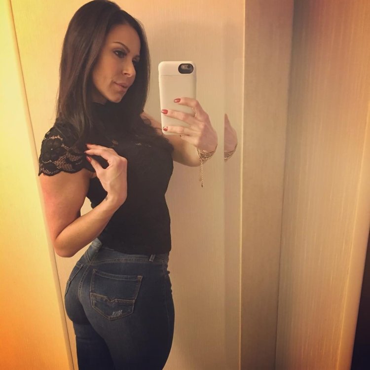 Kendra Lust in a dress with stockings