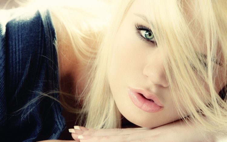 Blonde girl with green eyes