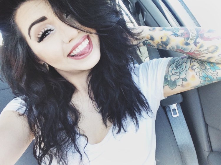 Tattooed girls selfie