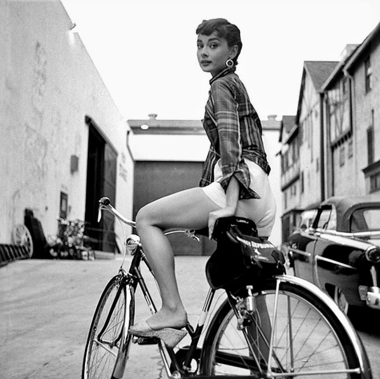 Audrey Hepburn on a bike