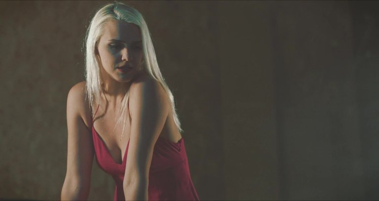 Emily Lewis in a swimsuit