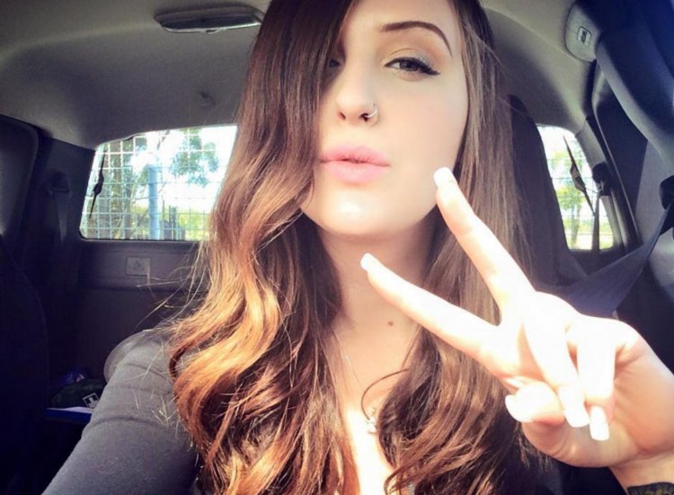 Beautiful girl in the car selfie