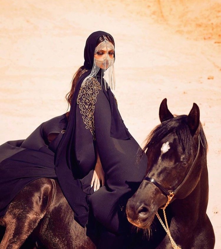 Muslim woman in the desert