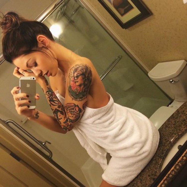 Girl with tattoo selfie