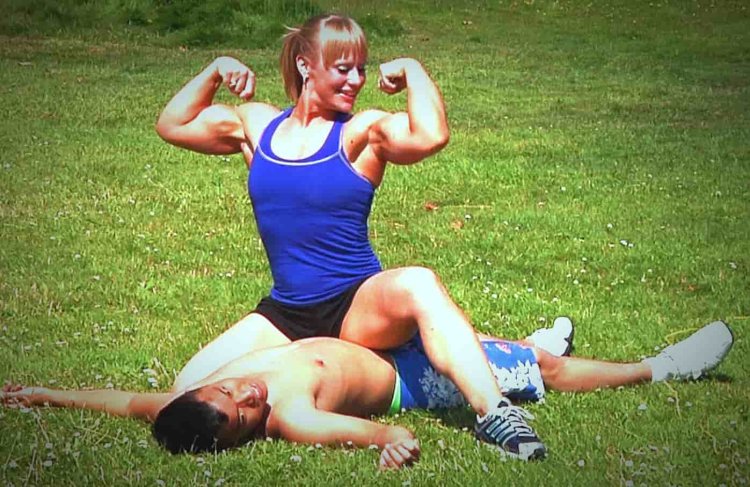 Muscular woman against