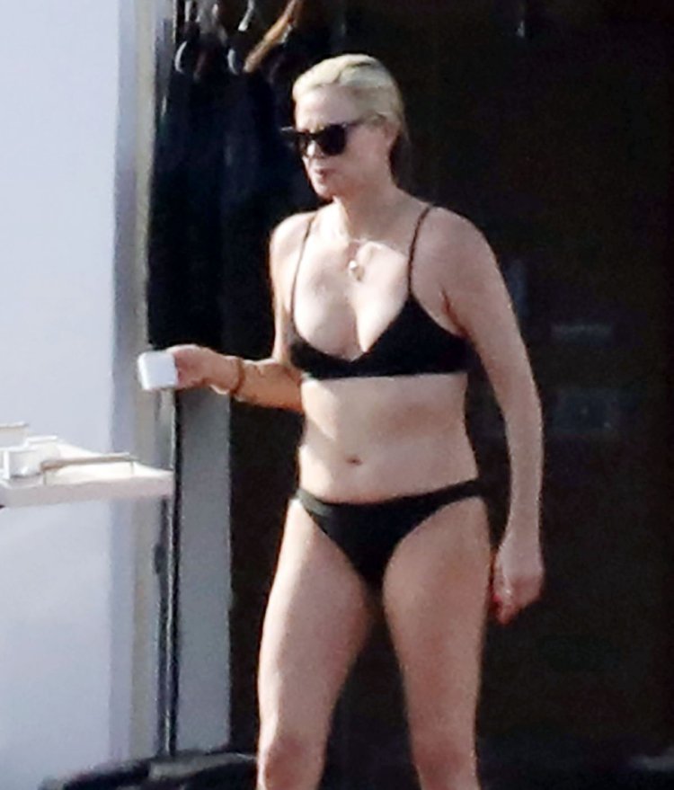 Charlize Theron is in a bathing suit