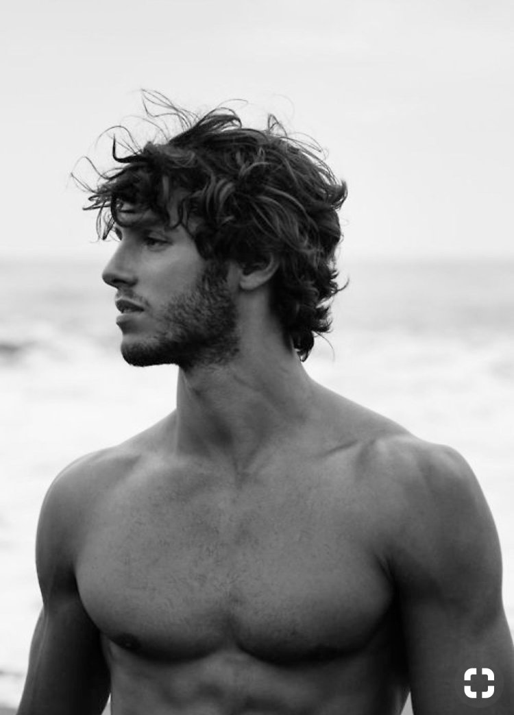 Curly girl in a swimsuit