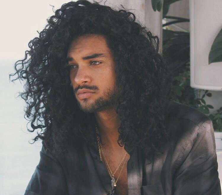 Curly guy with glasses