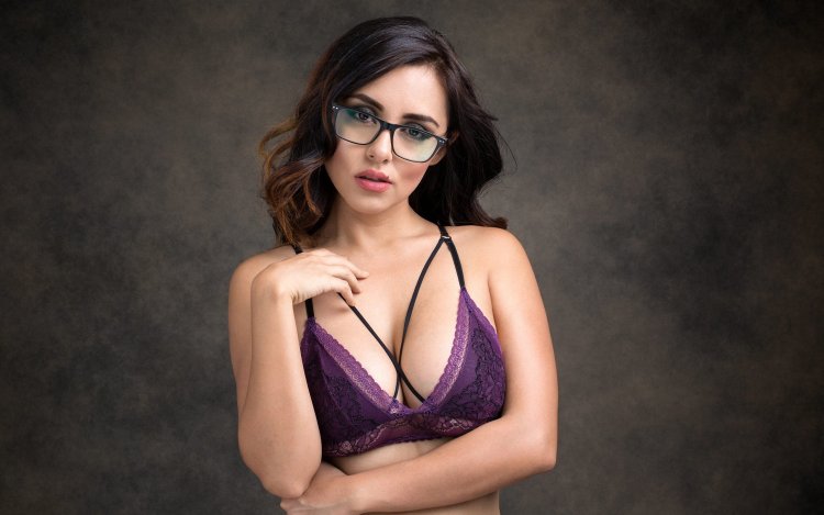 Dillion Harper bespectacled