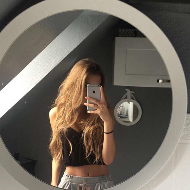 Beautiful girl in the mirror